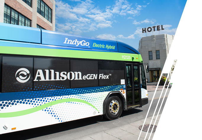 A blue and green transit IndyGo bus with "Allison eGen Flex" on the windows.