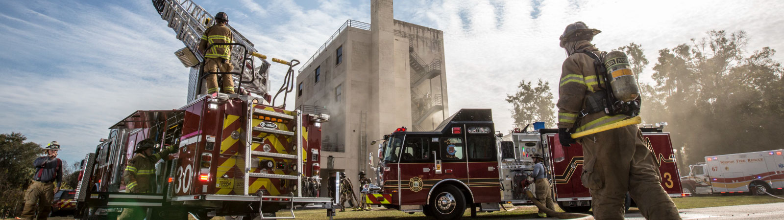 Two fire engines are staged for a response.